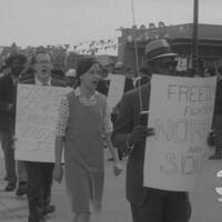 Still from newsreel of Congress of Racial Equality protest in front of Niagara Mohawk building (May 6, 1965 6PM WSYR Broadcast)